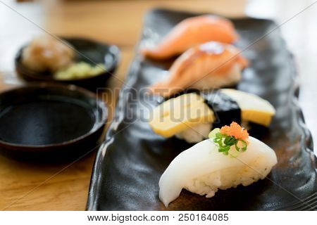 Assorted Varieties Of Sushi Platter. Raw Fish Sushi. Japanese Food. Salmon Burn, Salmon, Ika And Tam