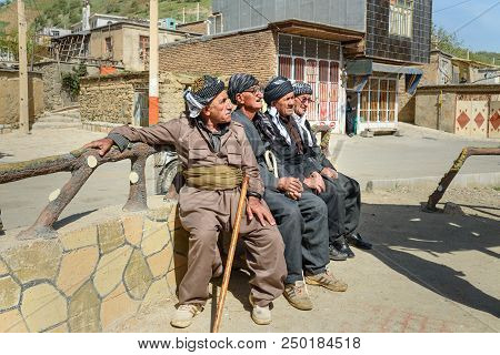 Marivan, Kurdistan, Iran - April 6, 2018: Kurdish Elderly Men In Darreh Tafi Village Near Zarivar La
