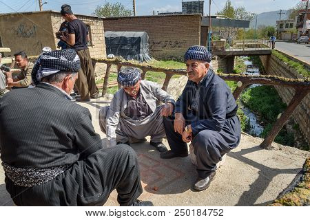 Marivan, Kurdistan Province, Iran - April 6, 2018: Kurdish Men In Darreh Tafi Village Near Zarivar L