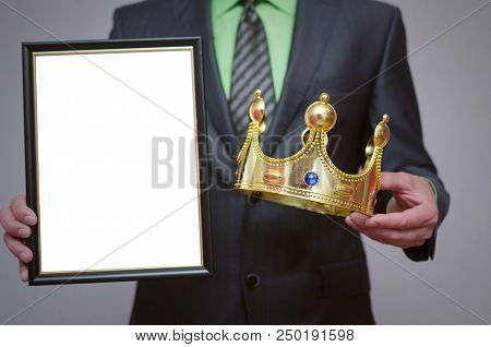 Winner Blank Diploma Or Certificate Mockup In Businessman Hand. Man Is Holding A Blank Photo Frame W
