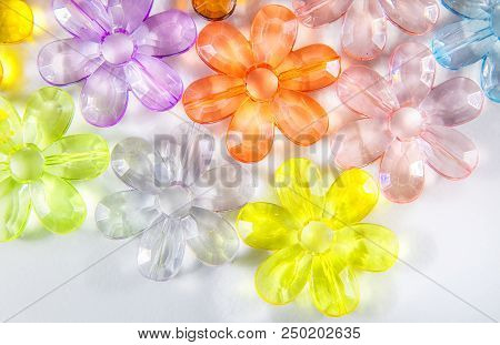 Colored Glass Transparent Flowers In A Colored Background On White