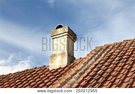 Old Town Of Odense, Denmark. Tile Roof With Chimney.