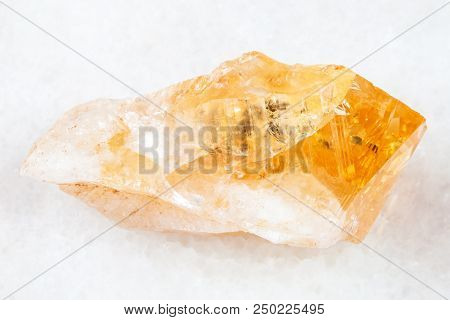 Macro Shooting Of Natural Rock Specimen - Rough Crystal Of Citrine (yellow Quartz) Gemstone On White
