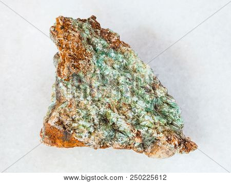 Macro Shooting Of Natural Mineral - Rough Pyrophyllite Stone On White Marble From Ural Mountains