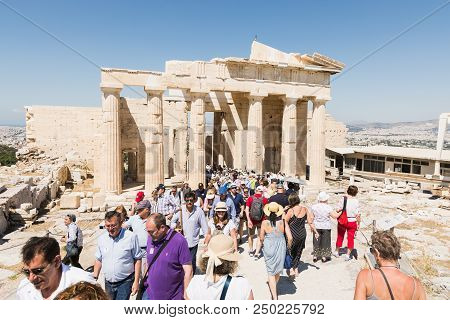 Athens, Greece - May 2018: Tourists Visiting The Ruins Of Parthenon Temple On The Acropolis Of Athen