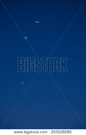 Conjuction Of Moon, Venus And Mercury As Seen From The Southern Part Of Earth.