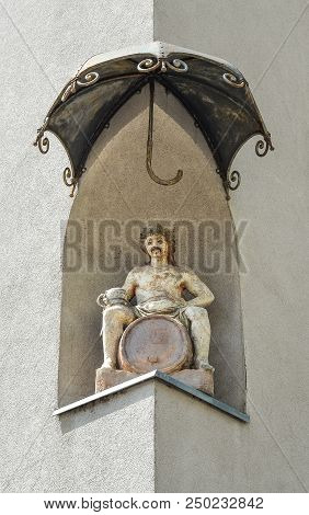 Maribor, Slovenia - May 22, 2018: Statue Of Dionysus In The Corner Niche Of The Former Hotel Orel On