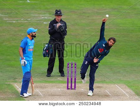 LEEDS, ENGLAND - JULY 17: Virat Kohli, Paul Reiffel and Moeen Ali  during the 3rd Royal London One day International match between England and India at Headingley Cricket Ground