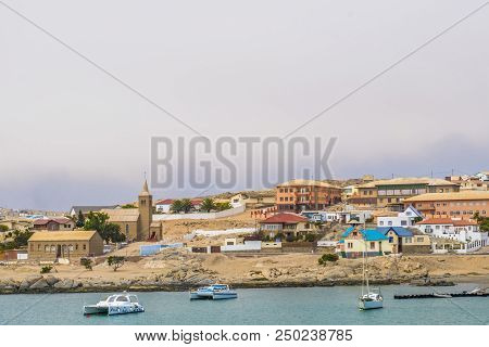 Luderitz, Namibia - March 23 2018: Remote Namibian Town Of Luderitz, Under Cloudy Skies, Taken From 