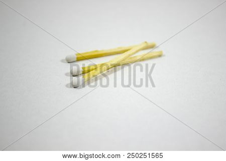 Angled Close-up Shot Of Random Spreaded Multiple White Match Head Covered Matches