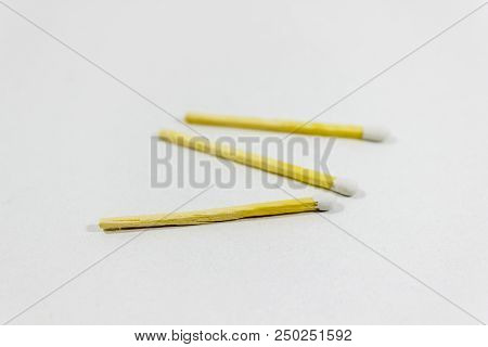 Angled Close-up Shot Of Front Random Spreaded Multiple White Match Head Covered Matches