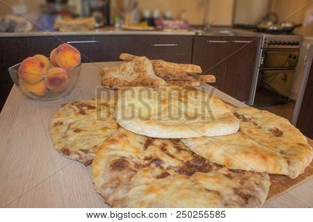 Close-up Georgian Lobiani Or Traditional Flatbread With Red Beans Stuffing. Favorite Food Concept