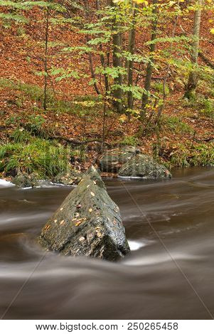 Rock In The Middle Of The Ninglinspo River Near Nonceveux In The Belgian Municipalit Aywaille