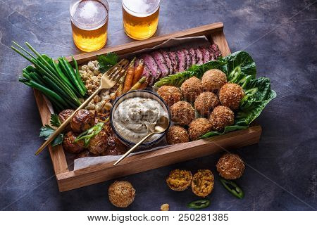 Arabian Meze Food Falafel, Beef, Babaghanous, Fried Cauliflower And Beans