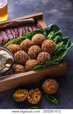 Falafel Balls On A Romano Leafs In A Wooden Box.