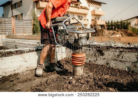 Close Up Details Of Vibratory Compactor At Construction Site
