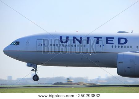 Amsterdam The Netherlands - April 2nd, 2017: N77012 United Airlines Boeing 777-200 Takeoff From Pold