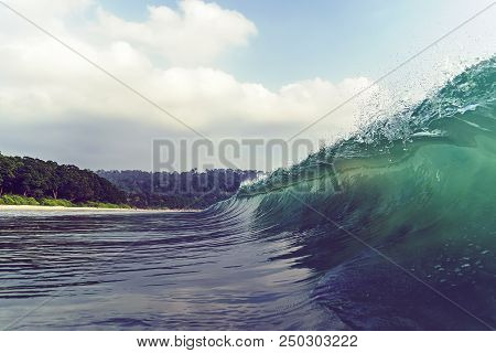 Looking At A Barreling Wave Break In An Empty Line Up. Under The Crest Of A Wave. Crest Of Wave