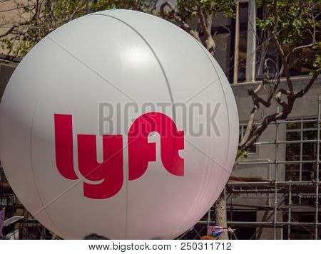 San Francisco, Ca June 23, 2018: Large White Lyft Balloon Waving In An Urban Setting