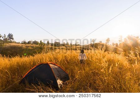 Outdoors Camping Grass Highlands Mountain In The Sunset.