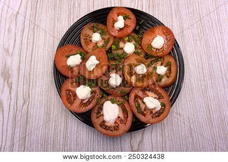 Canning Fresh Tomatoes With Onions In Jelly Marinade. A Shot Of Woman Hands Putting Red Ripe Tomato 