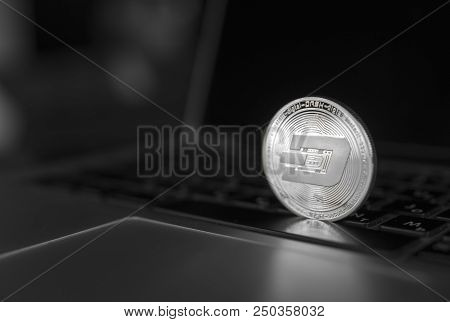 Dash Coin Symbol On Laptop. Concept Financial Currency, Crypto Currency Sign. Blockchain Mining. Dig