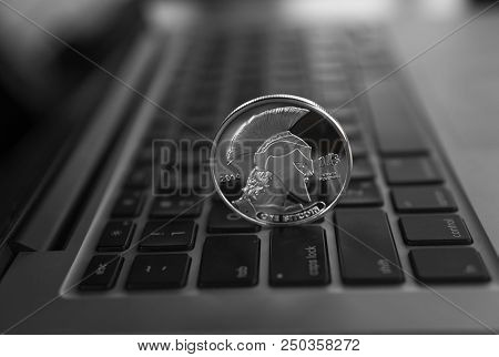 Titan Bitcoin Coin Symbol On Laptop. Concept Financial Currency, Crypto Currency Sign. Blockchain Mi