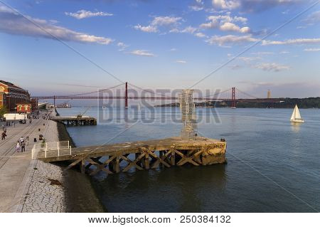 Lisbon, Portugal - June 23, 2018: View Of The Tagus River (rio Tejo) And The 25 Of April Bridge On T