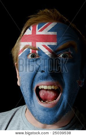 Face Of Crazy Angry Man Painted In Colors Of New Zealand Flag
