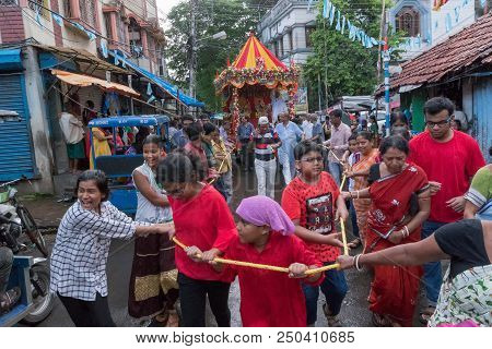 Howrah, West Bengal , India - July 14th 2018 : Devotees Dragging Ropes Of Rath (chariot) Of God Jaga