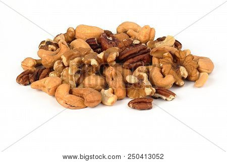 Picture Of Tasty Walnuts, Pecans And Chews, Ready For You To Eat.on A White Back Ground