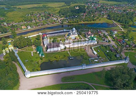 View From Height On The Tikhvinsky Bogodichny Uspensky Monastery In The Sunny Summer Day. Tikhvin, R
