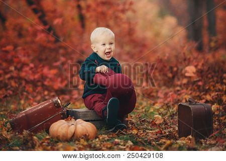 Little Boy With Suit Case On Railway Out Door. Travel Concept