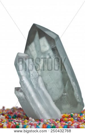 Clear Mystical Faceted Crystal Of Quartz Chalcedony On A Multicolored Background Close-up. Wonderful
