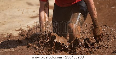 Mud Race Runners During Extreme Obstacle Races