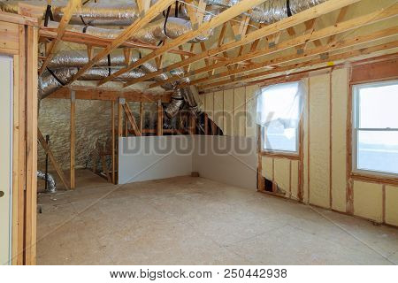 Work Site Of Installing Thermal Foam Insulation Under The Roof Foam Wool Panels And Polyurea Sprayin