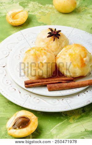 Dumplings With Apricot And Syrup
