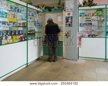 Gryazi, Russia - July 5. 2018. Pensioner Buys Medicines In A Pharmacy In Department Of Preferential 