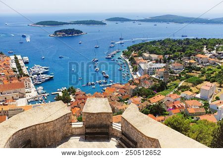 Breathtaking View Of Hvar Town And Its Harbor From The Spanish Fortress With The Castle Bastion In T