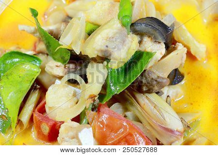 Spicy Tom Yum Soup In White Blow With Herb, A Spicy Clear Soup Typical In Thailand And No.1 Thai Dis