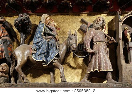 PARIS, FRANCE - JANUARY 04: Intricately carved and painted frieze inside Notre Dame Cathedral depicting Flight into Egypt, UNESCO World Heritage Site in Paris, France on January 04, 2018.