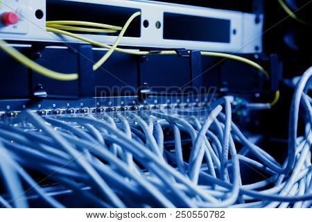Modern High Tech Internet Data Center Room With Network Panel, Switch And Cable