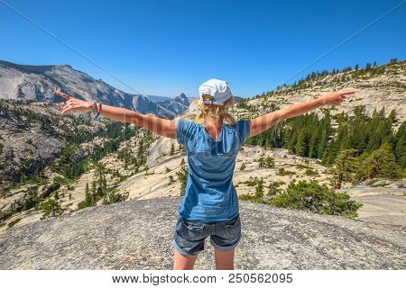 Hiking Woman Enthusiastic With Open Arms At Olmsted Point. Tired Hiker Resting Happy And Taking A Br
