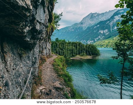 Dangerous Mountain Path At A Lake In The Swiss Alps, Hiking Klontalersee Switzerland