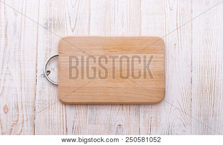 Cutting Board Top View On Wooden Background