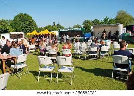 TENTERDEN, ENGLAND - MAY 20, 2018: People enjoy the annual Food and Drink Festival at Tenterden in Kent. The event was first held in 2017.