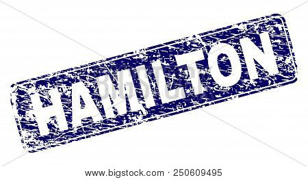 Hamilton Stamp Seal Print With Distress Texture. Seal Shape Is A Rounded Rectangle With Frame. Blue 