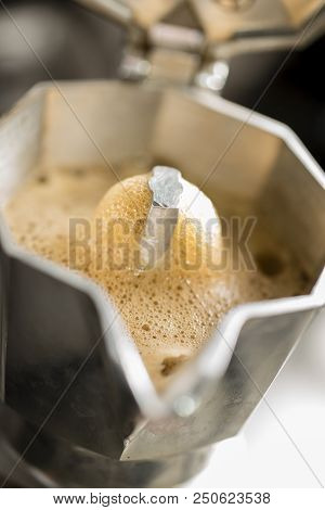 Traditional Italian Moka Machine With Fresh Hot Coffee Coming Up.