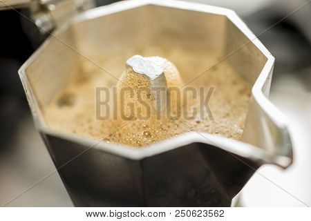 Traditional Italian Moka Machine With Fresh Hot Coffee Coming Up.