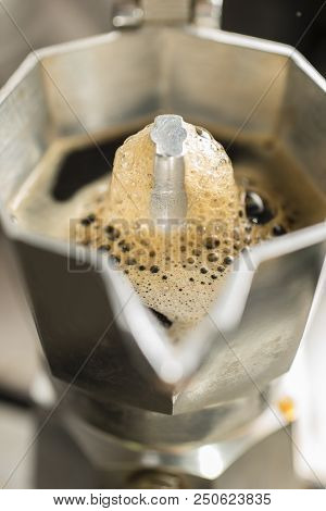 Traditional Italian Moka Machine With Fresh Hot Coffee Coming Up.